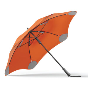 Orange umbrella with gray accents on a white background