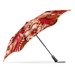 Floral-patterned umbrella on a white background