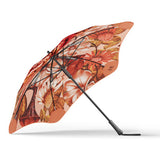 Floral-patterned umbrella on a white background