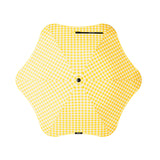 Yellow checkered umbrella on a white background